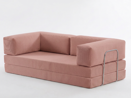 Slaapbank Fluffy in oud roze als sofa, hoekaanzicht op witte achtergrond