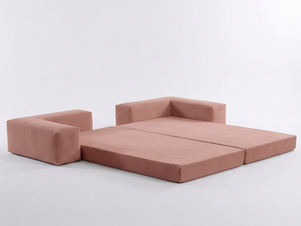 Slaapbank Fluffy in oud roze, gedeeltelijk uitgeklapt tot bed